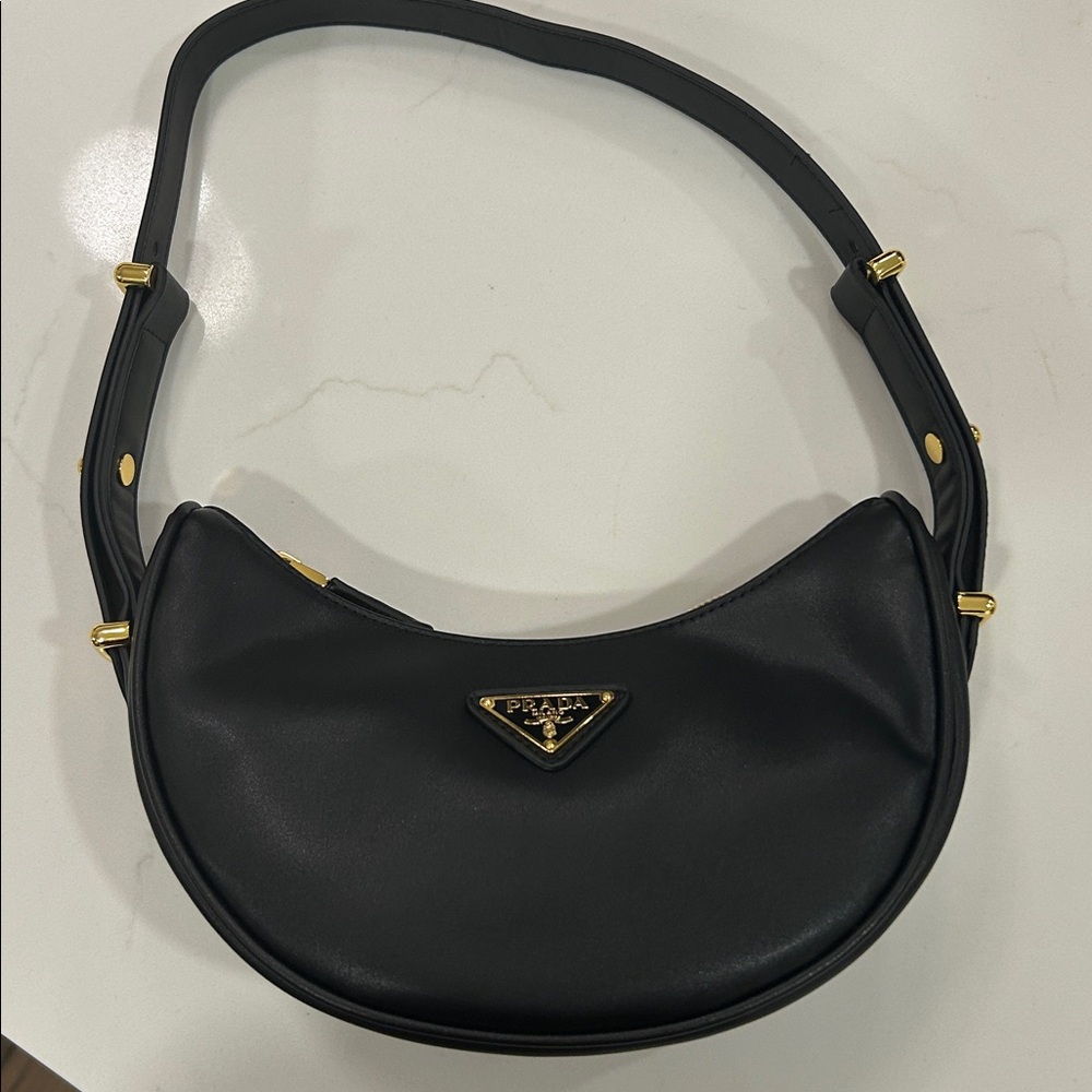 Prada Arque Small Black Leather Shoulder Bag with Gold Accents